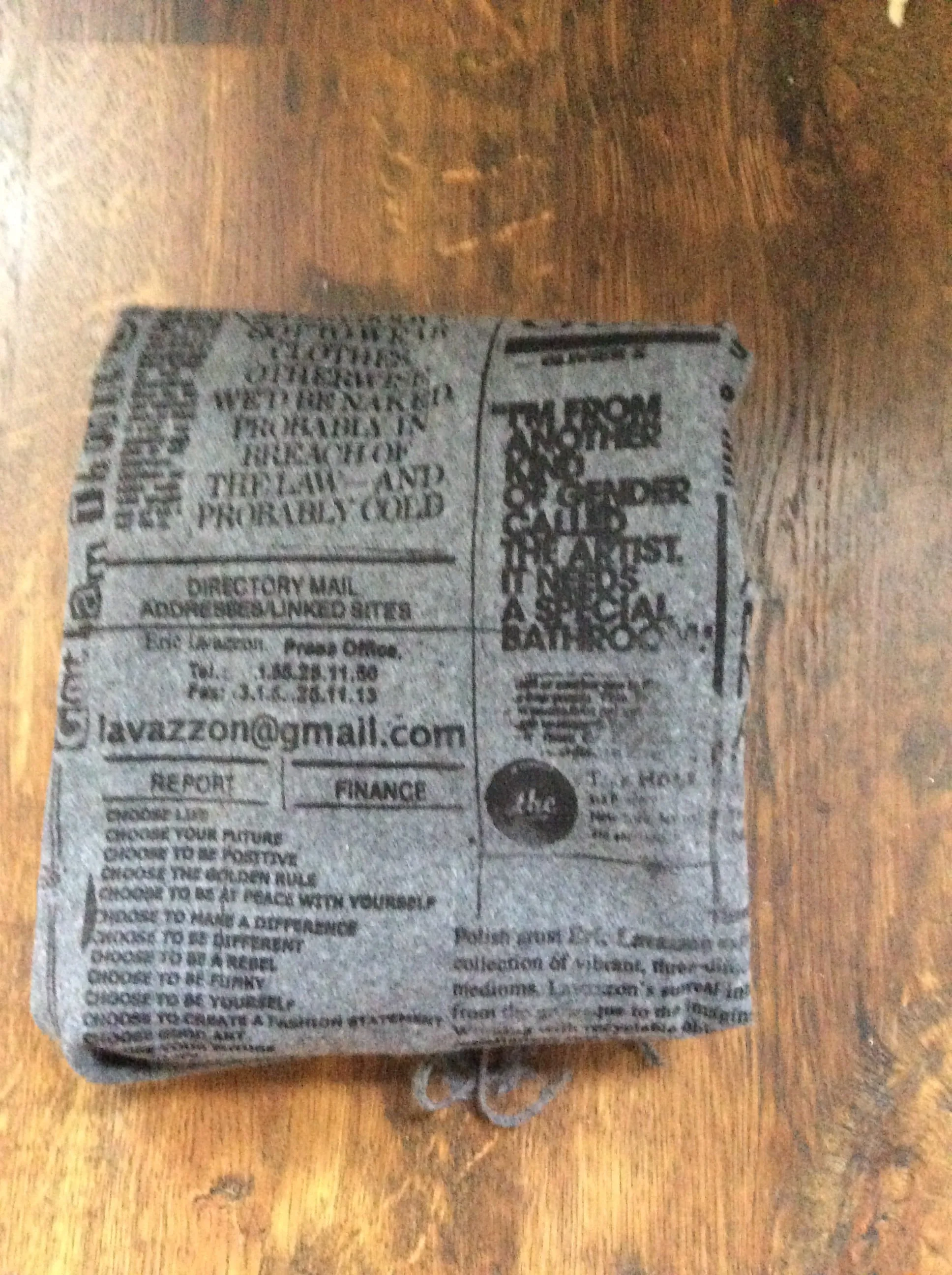 Lavazzon Cashmere feel newsprint scarf. Unisex
